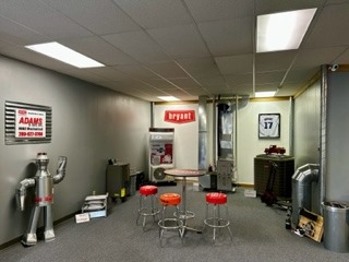 Interior photo of the ADAMS & Son, Inc. HVAC Mechanical Custom Flames Showroom in Benton Harbor